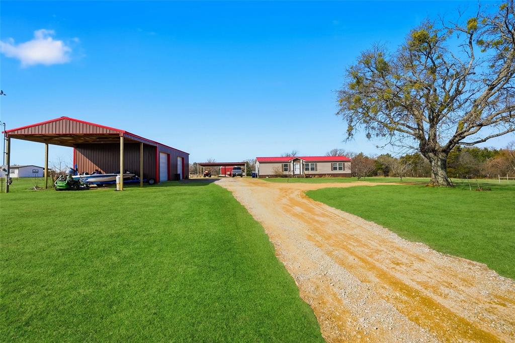 1949 Greer Road Sadler, TX 76264 - Photo 1 of 39 a view of an house with backyard space and garden