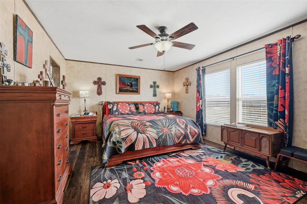 1949 Greer Road Sadler, TX 76264 - Photo 15 of 39 a bedroom with a bed and a window