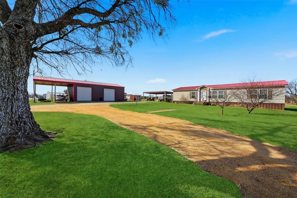 1949 Greer Road Sadler, TX 76264 - Photo 2 of 39 a view of a house with a big yard