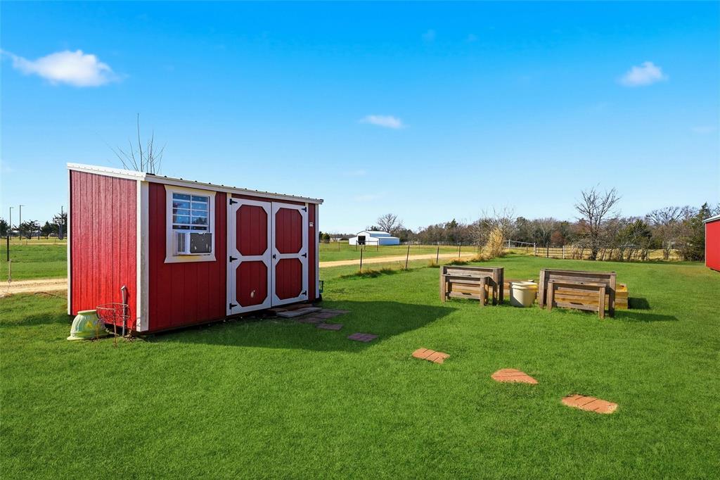 1949 Greer Road Sadler, TX 76264 - Photo 34 of 39 a view of a backyard with swimming pool