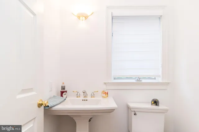 a bathroom with a sink and a toilet