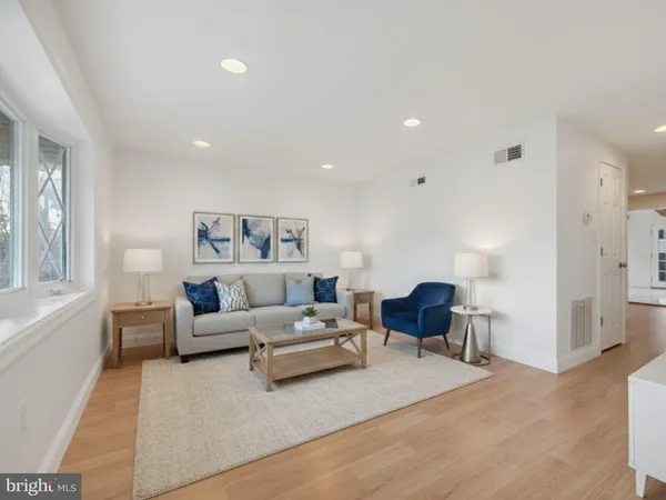 a living room with furniture and a couch