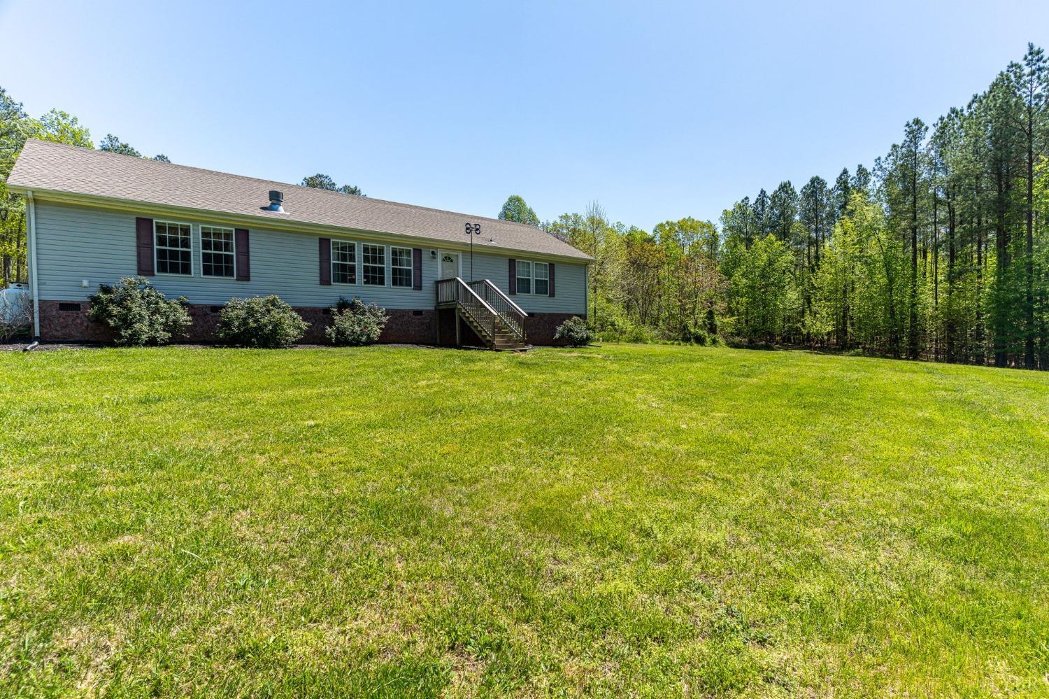 2570 Reedy Spring Road Spout Spring, VA 24593 - Photo 1 of 66 a front view of house with yard and green space