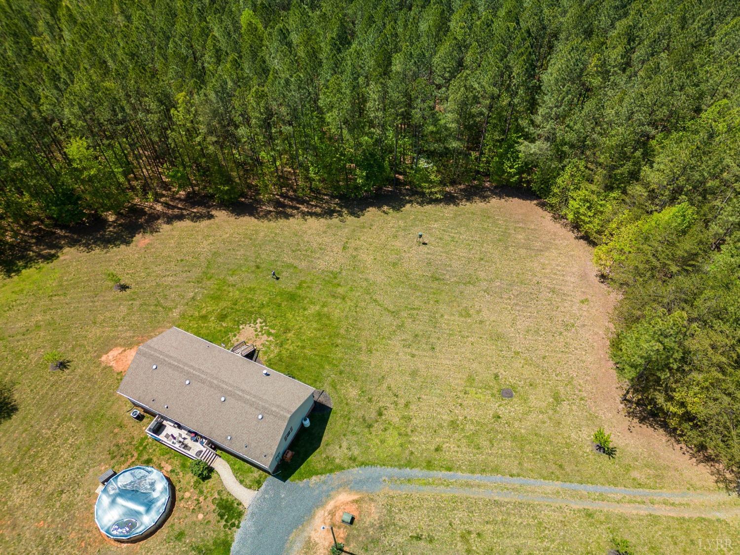 2570 Reedy Spring Road Spout Spring, VA 24593 - Photo 34 of 66 an aerial view of a house with a yard