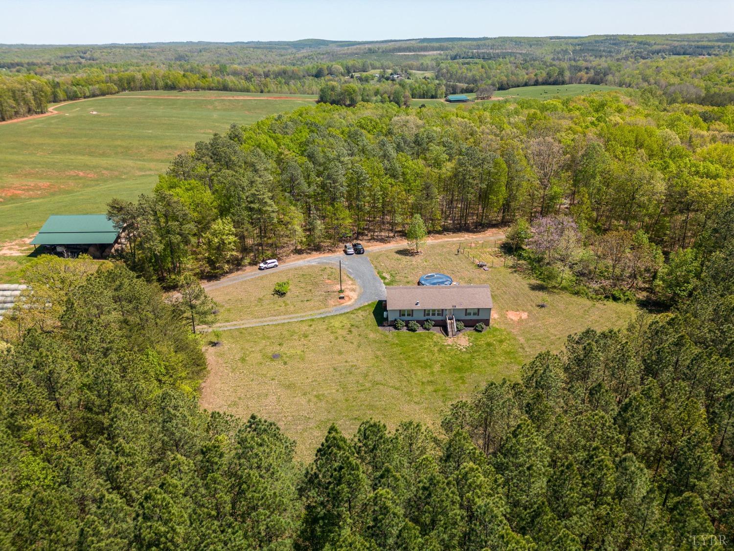 2570 Reedy Spring Road Spout Spring, VA 24593 - Photo 40 of 66 a aerial view of a house with a lake view
