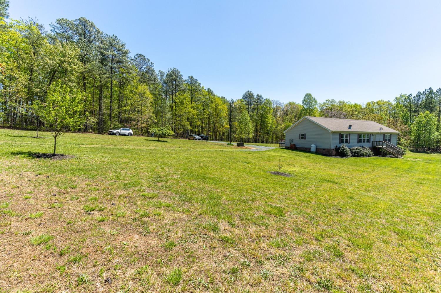 2570 Reedy Spring Road Spout Spring, VA 24593 - Photo 52 of 66 a view of a house with a big yard
