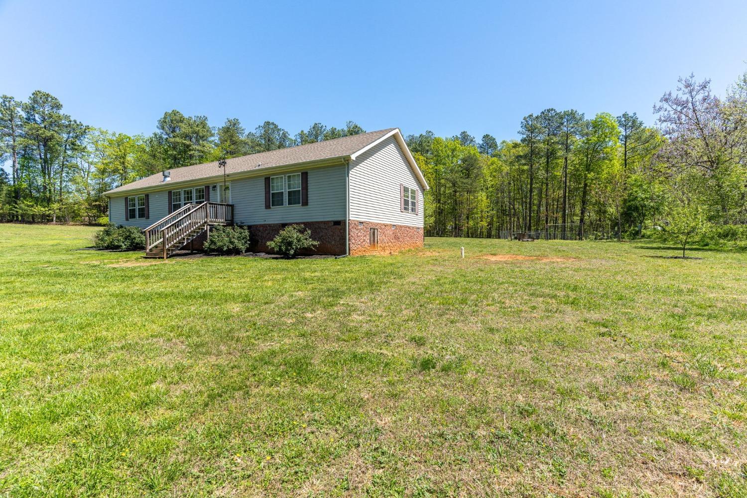 2570 Reedy Spring Road Spout Spring, VA 24593 - Photo 55 of 66 a view of a house with a yard
