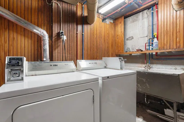 a front view of a building with sitting area