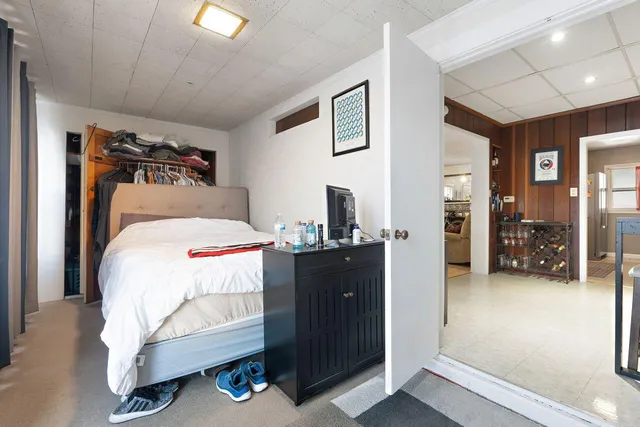 a kitchen with a sink cabinets and utility