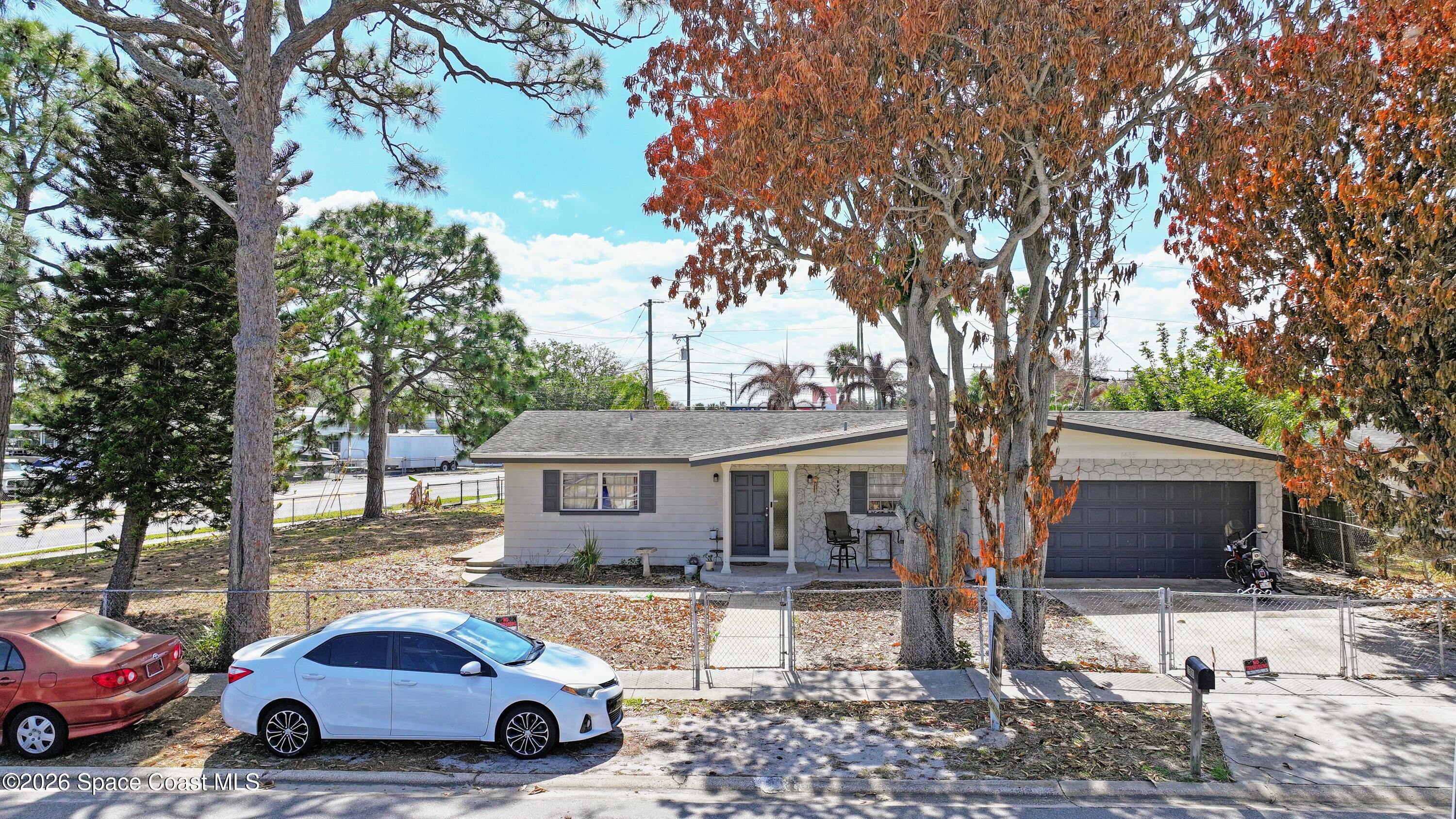 1300 Lester Court Merritt Island, FL 32952 - Photo 2 of 50 dji_fly_20260226_121410_0559_17721267459