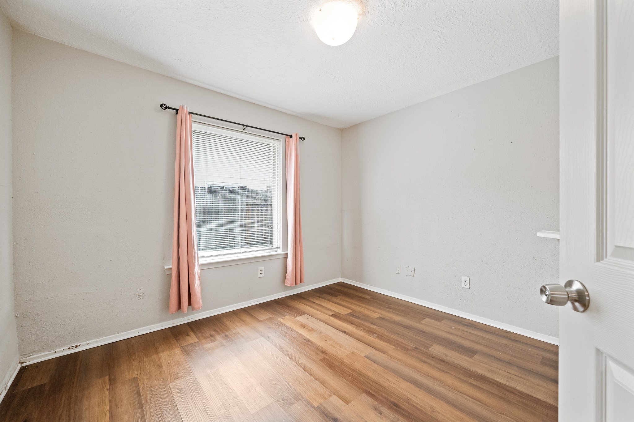 20115 Raingate Lane Katy, TX 77449 - Photo 15 of 25 a view of an empty room with a window