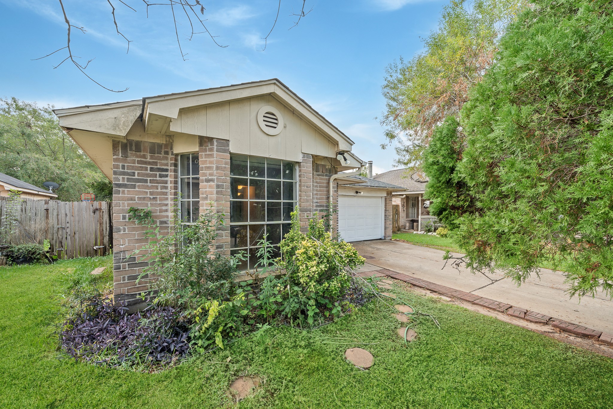 20115 Raingate Lane Katy, TX 77449 - Photo 2 of 25 a view of a house with a yard and plants