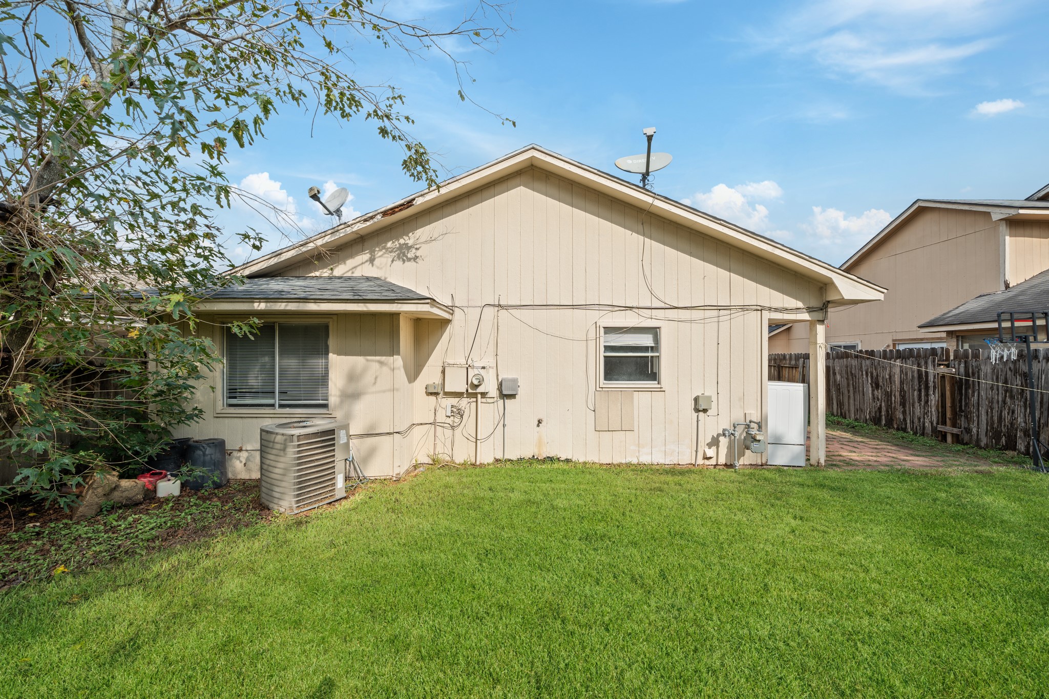 20115 Raingate Lane Katy, TX 77449 - Photo 24 of 25 a front view of a house with a yard and garage