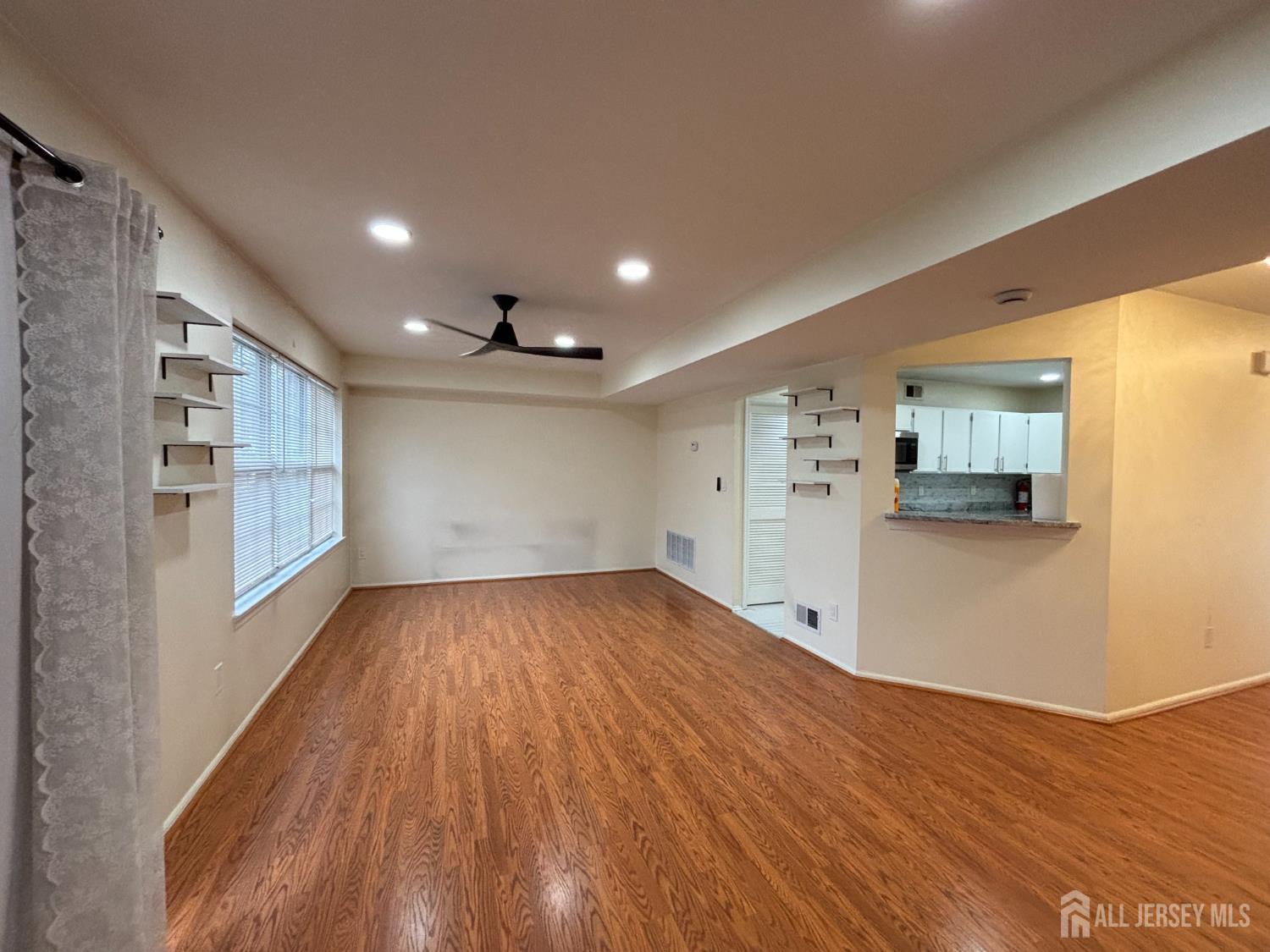 1301 Plymouth Road North Brunswick, NJ 08902 - Photo 20 of 21 a view of empty room with wooden floor