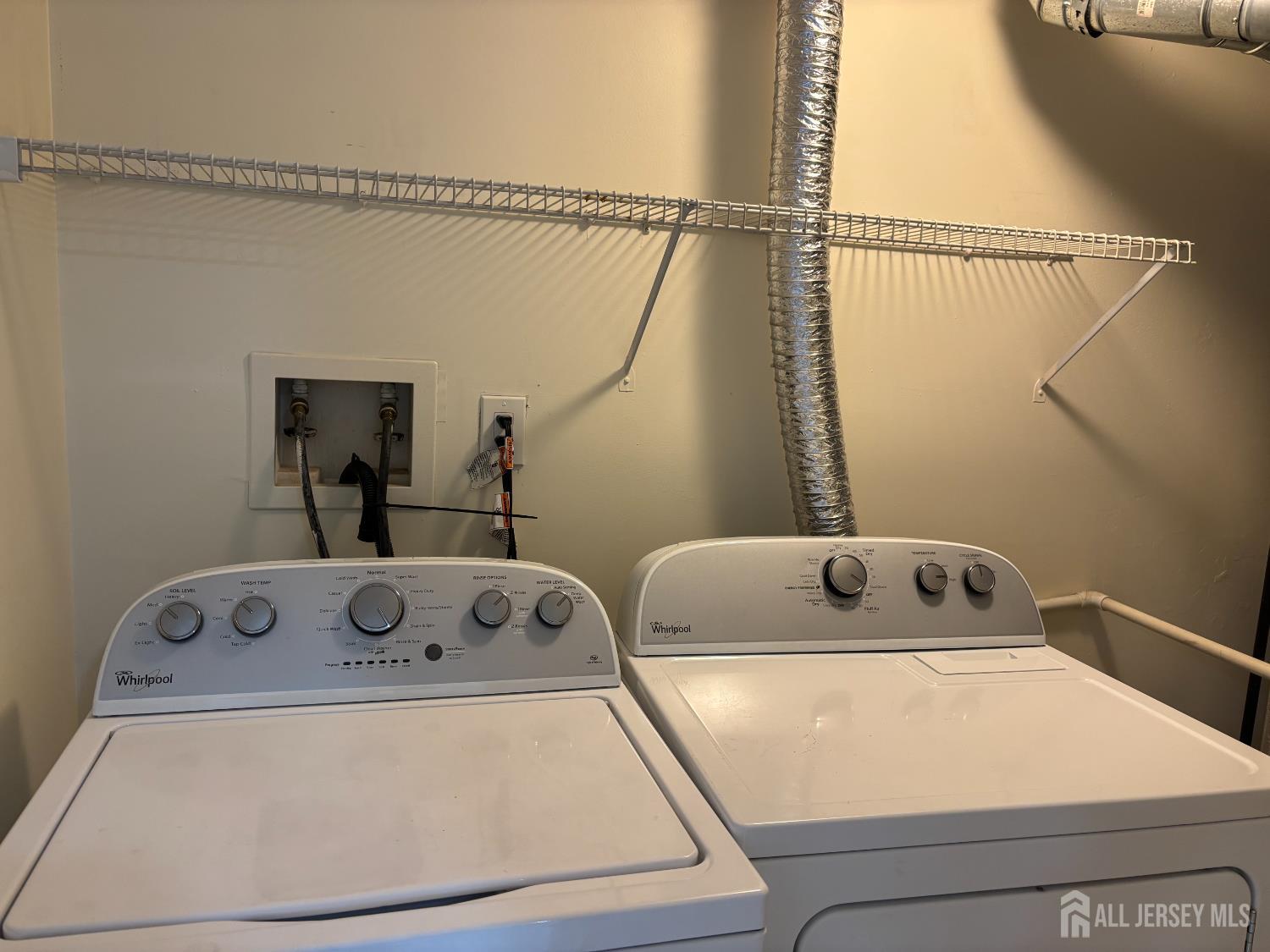 1301 Plymouth Road North Brunswick, NJ 08902 - Photo 21 of 21 a utility room with dryer and washer