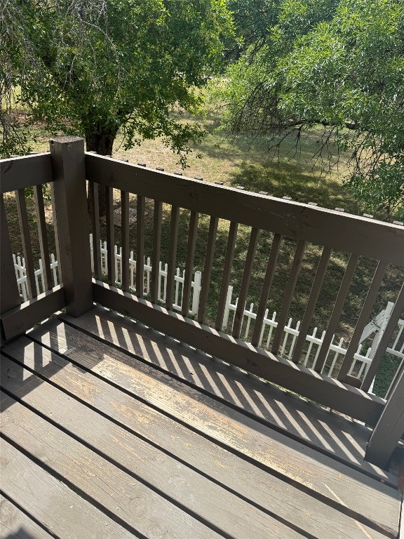 1802 River Crossing Circle, Unit C Austin, TX 78741 - Photo 17 of 19 a view of a wooden balcony
