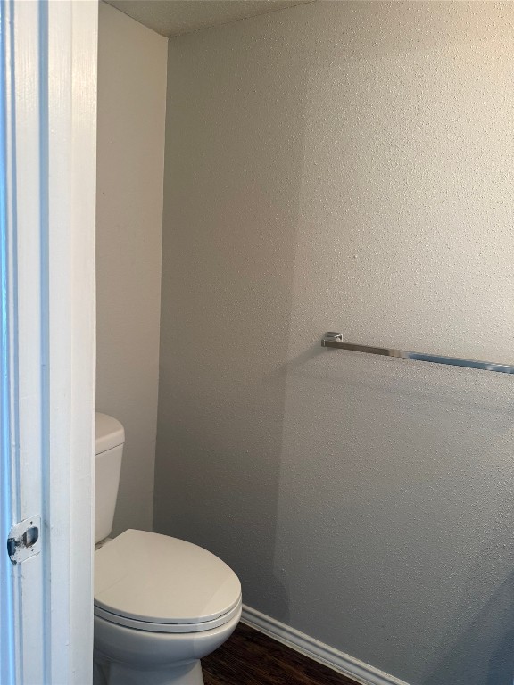 1802 River Crossing Circle, Unit C Austin, TX 78741 - Photo 3 of 19 a white toilet sitting next to a shower