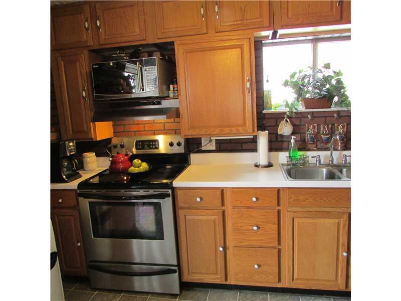 222 Little Blue Road Georgetown, PA 15043 - Photo 8 of 25 Kitchen. Double bowl sink,flat top electric range.