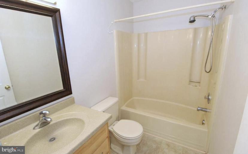 1003 Britton Place Voorhees, NJ 08043 - Photo 14 of 16 a bathroom with a sink toilet and shower