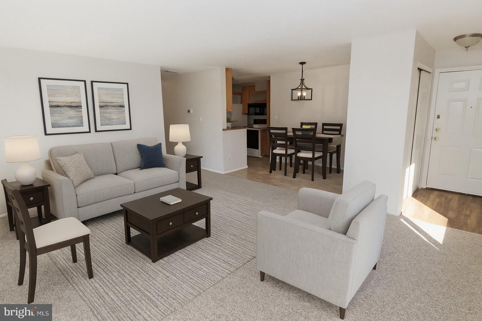 1003 Britton Place Voorhees, NJ 08043 - Photo 2 of 16 a living room with furniture and wooden floor