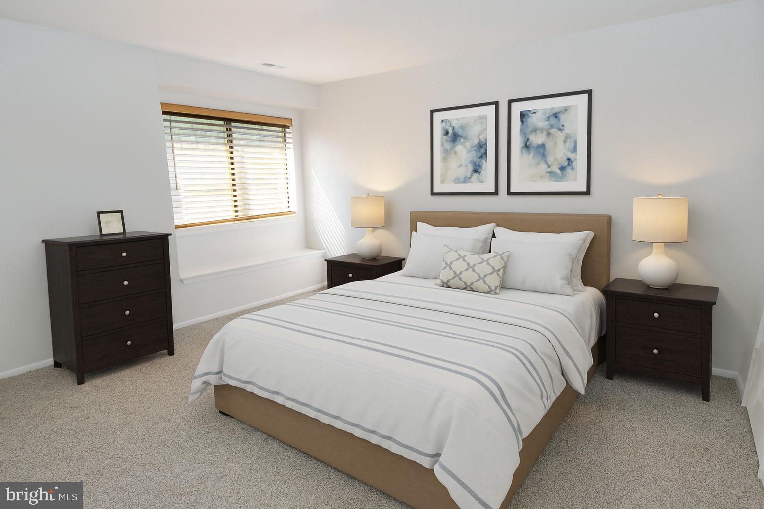1003 Britton Place Voorhees, NJ 08043 - Photo 9 of 16 a bedroom with a bed and a lamp on dresser