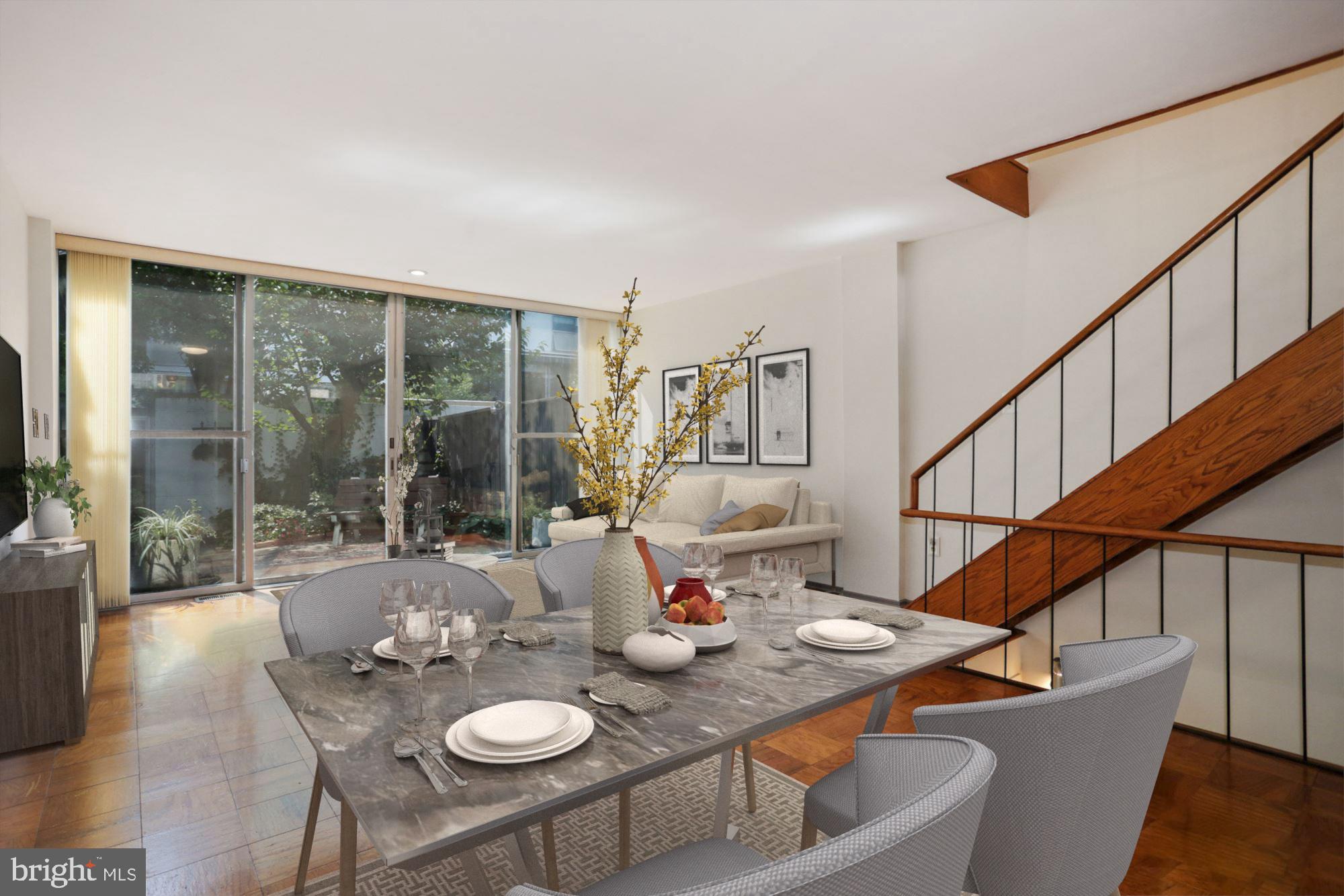 390 N Street Southwest Washington, DC 20024 - Photo 5 of 41 Sliding glass doors to patio - virtually staged