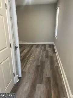 a bathroom with a sink and a window