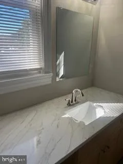 a bathroom with a toilet and a bathtub