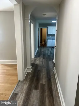 a view of a bathroom from a hallway