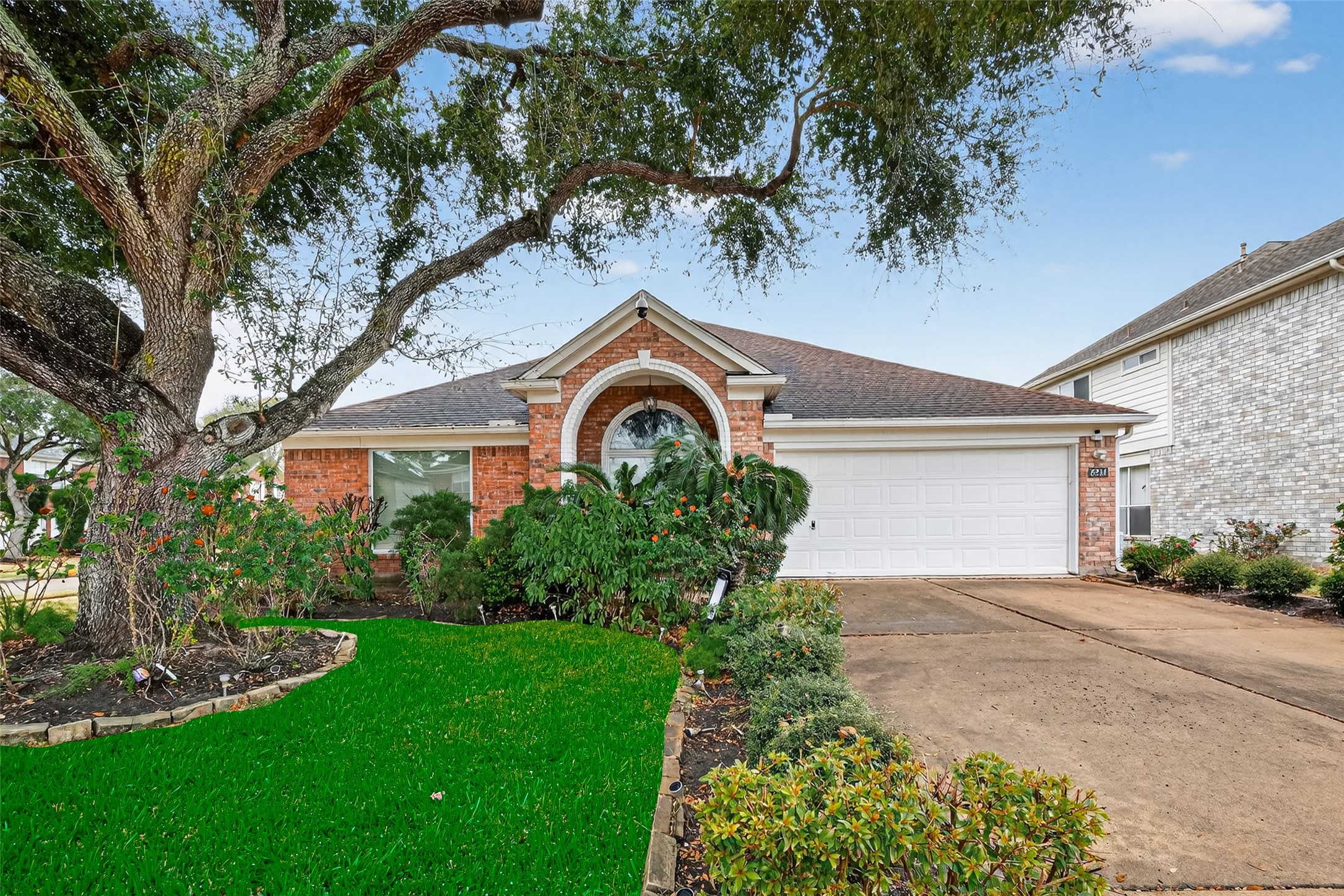 2214 Ruffian Lane Stafford, TX 77477 - Photo 2 of 31 a front view of a house with garden