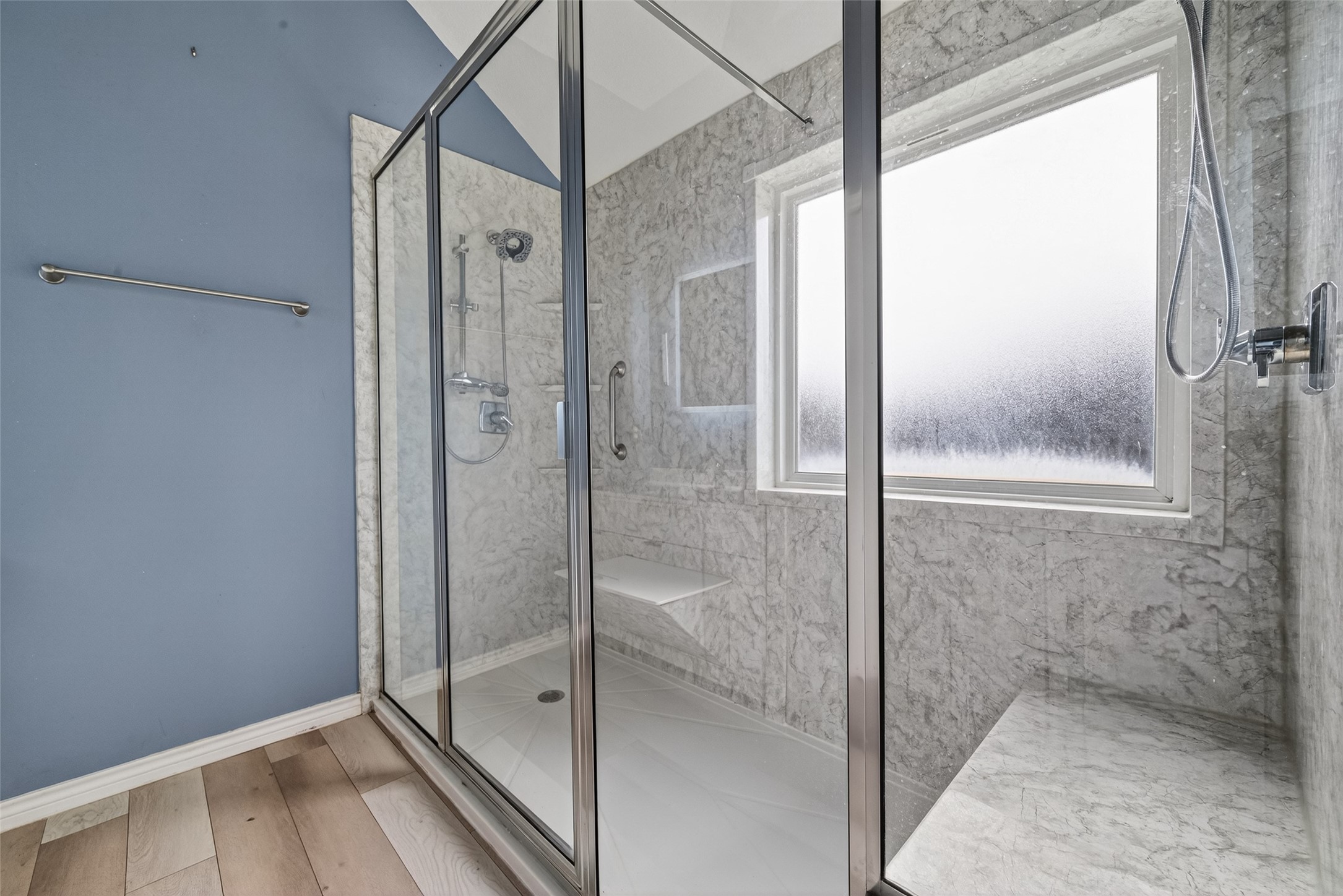 2214 Ruffian Lane Stafford, TX 77477 - Photo 25 of 31 a bathroom with a glass shower door