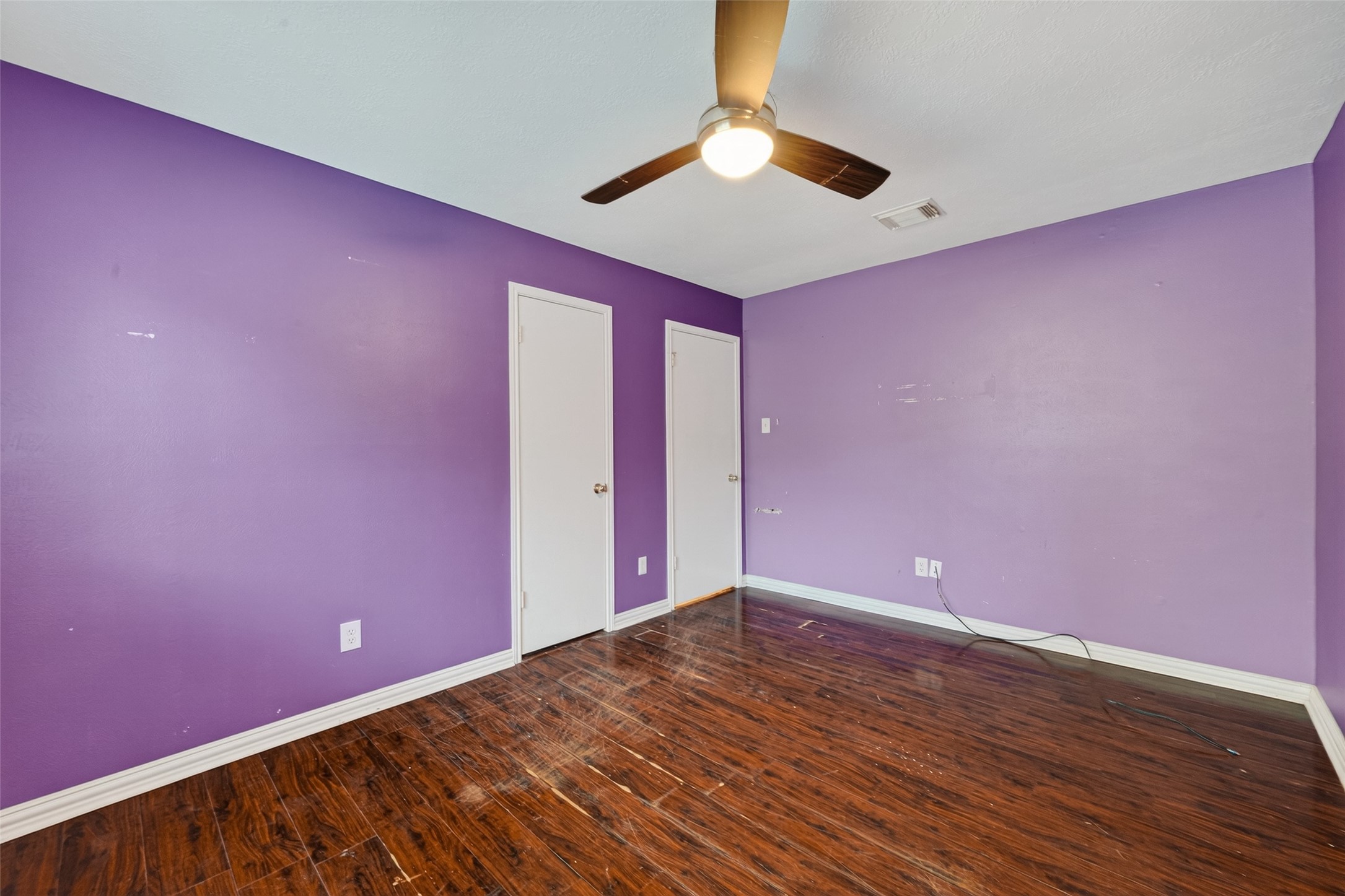 2214 Ruffian Lane Stafford, TX 77477 - Photo 27 of 31 an empty room with wooden floor