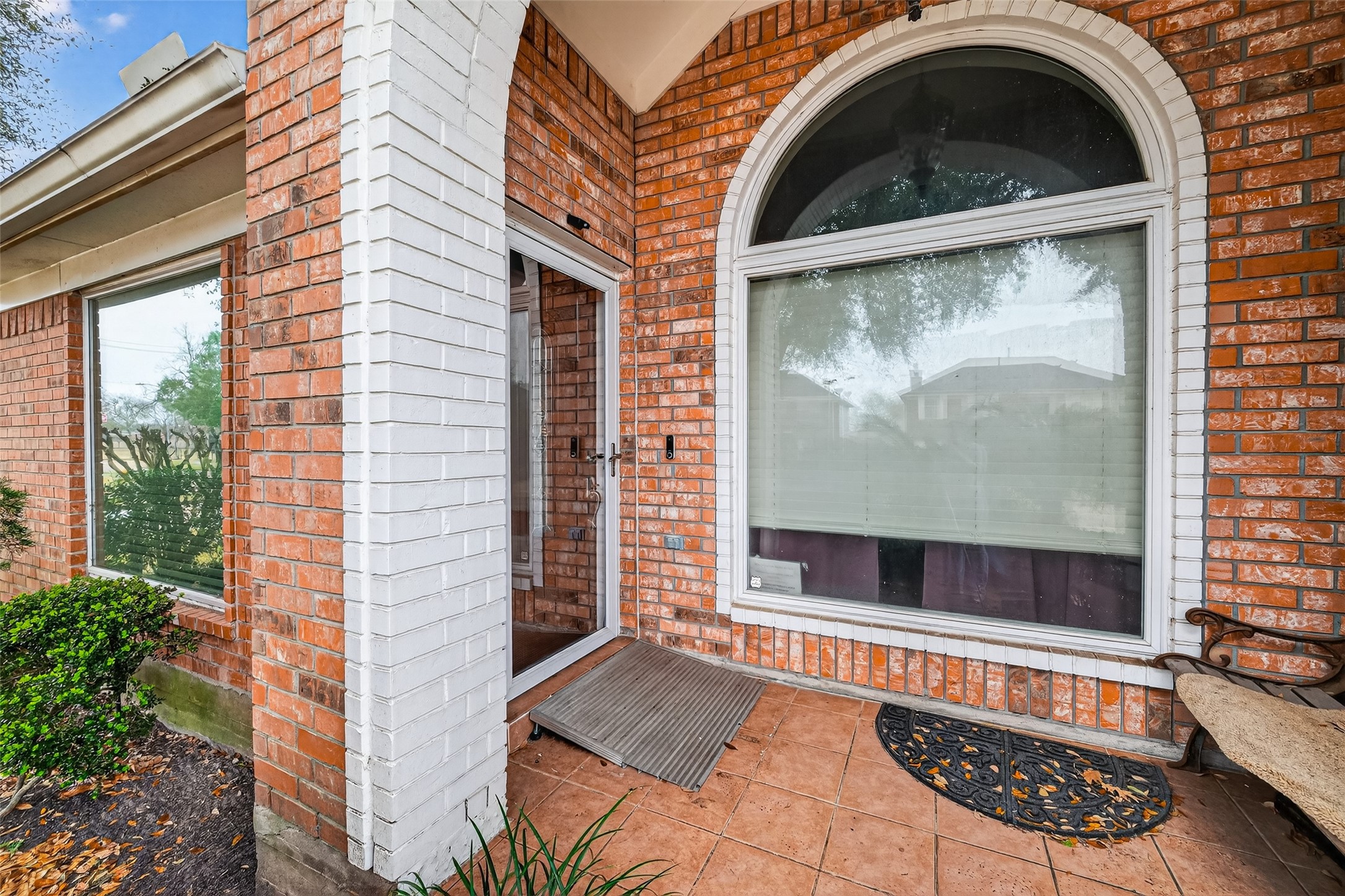 2214 Ruffian Lane Stafford, TX 77477 - Photo 4 of 31 a view of a door of a house with a balcony