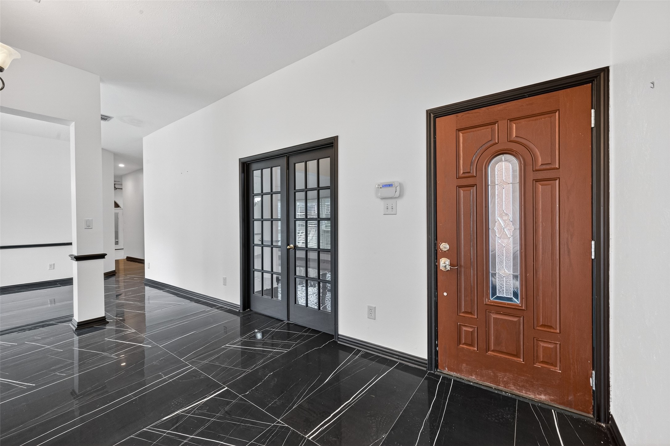 2214 Ruffian Lane Stafford, TX 77477 - Photo 6 of 31 a view of an entryway with a livingroom