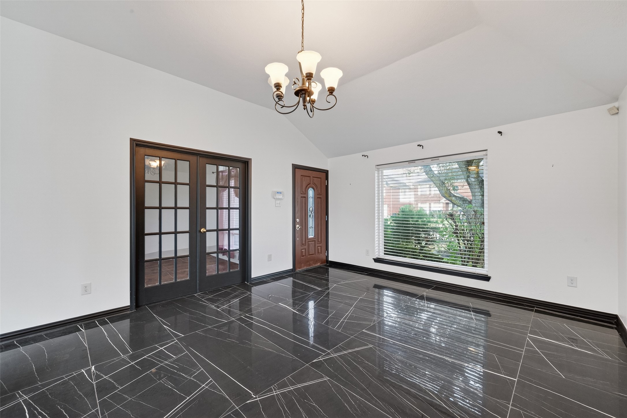 2214 Ruffian Lane Stafford, TX 77477 - Photo 9 of 31 a view of an empty room with a window
