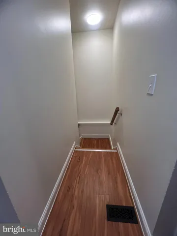 a view of a bedroom with washer and dryer
