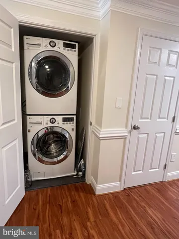 a view of a backyard with wooden fence