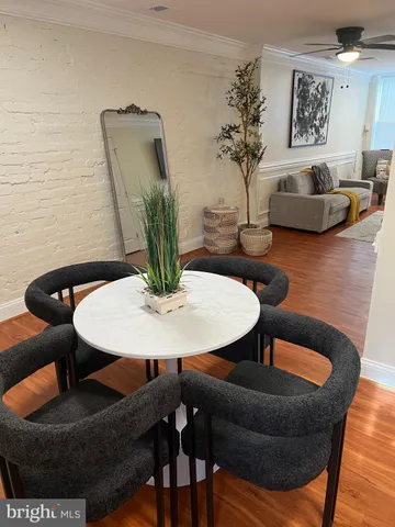 a view of a workspace with furniture