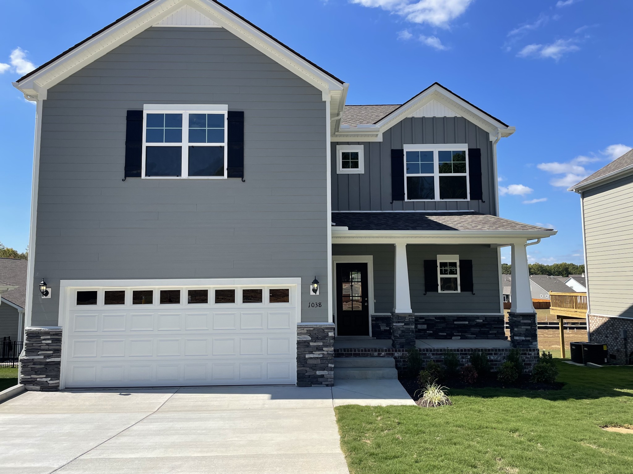 1038 Wiseman Farm Road Fairview, TN 37062 - Photo 1 of 11 a front view of a house with a yard