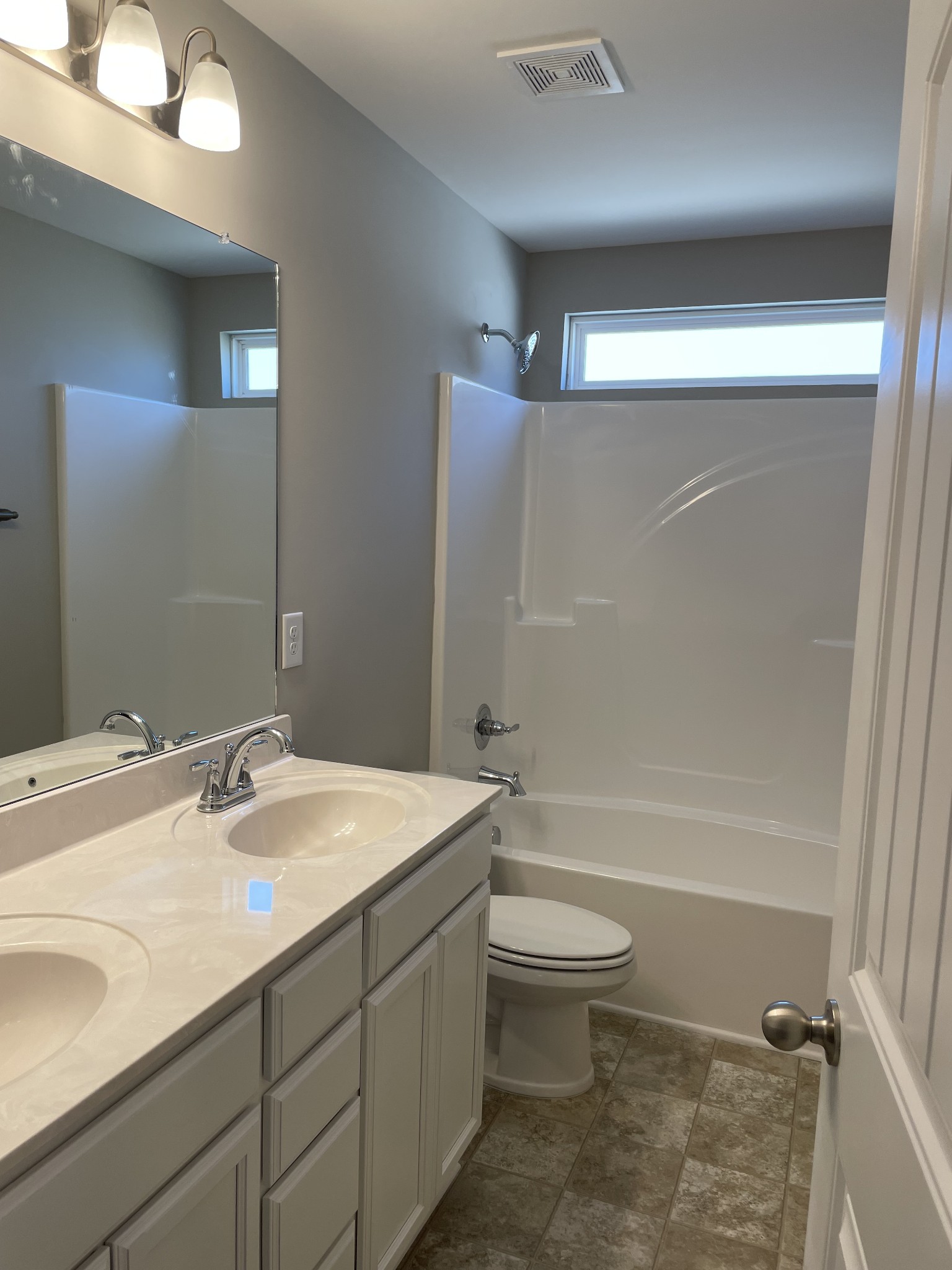 1038 Wiseman Farm Road Fairview, TN 37062 - Photo 5 of 11 a bathroom with a sink a toilet and shower