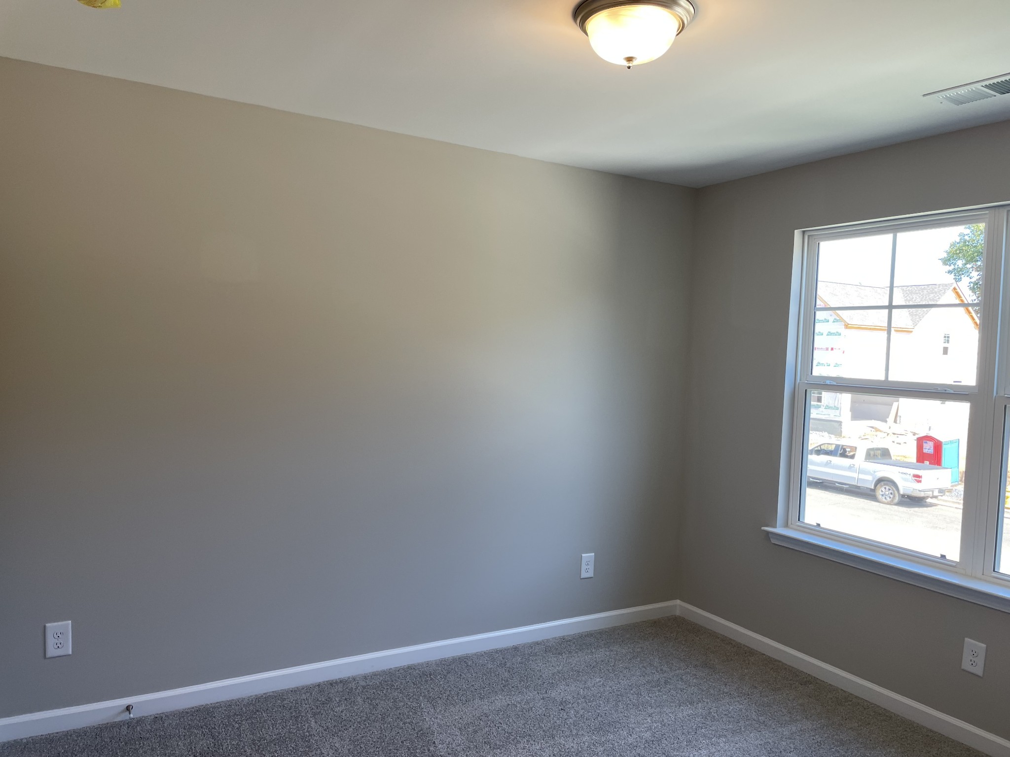 1038 Wiseman Farm Road Fairview, TN 37062 - Photo 7 of 11 an empty room with windows and