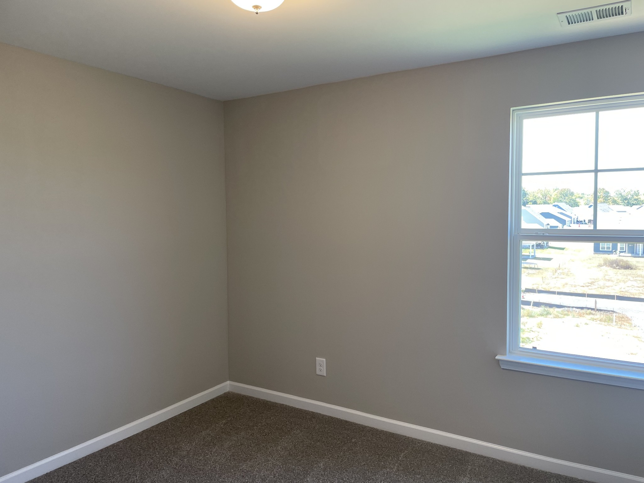 1038 Wiseman Farm Road Fairview, TN 37062 - Photo 10 of 11 an empty room with a window