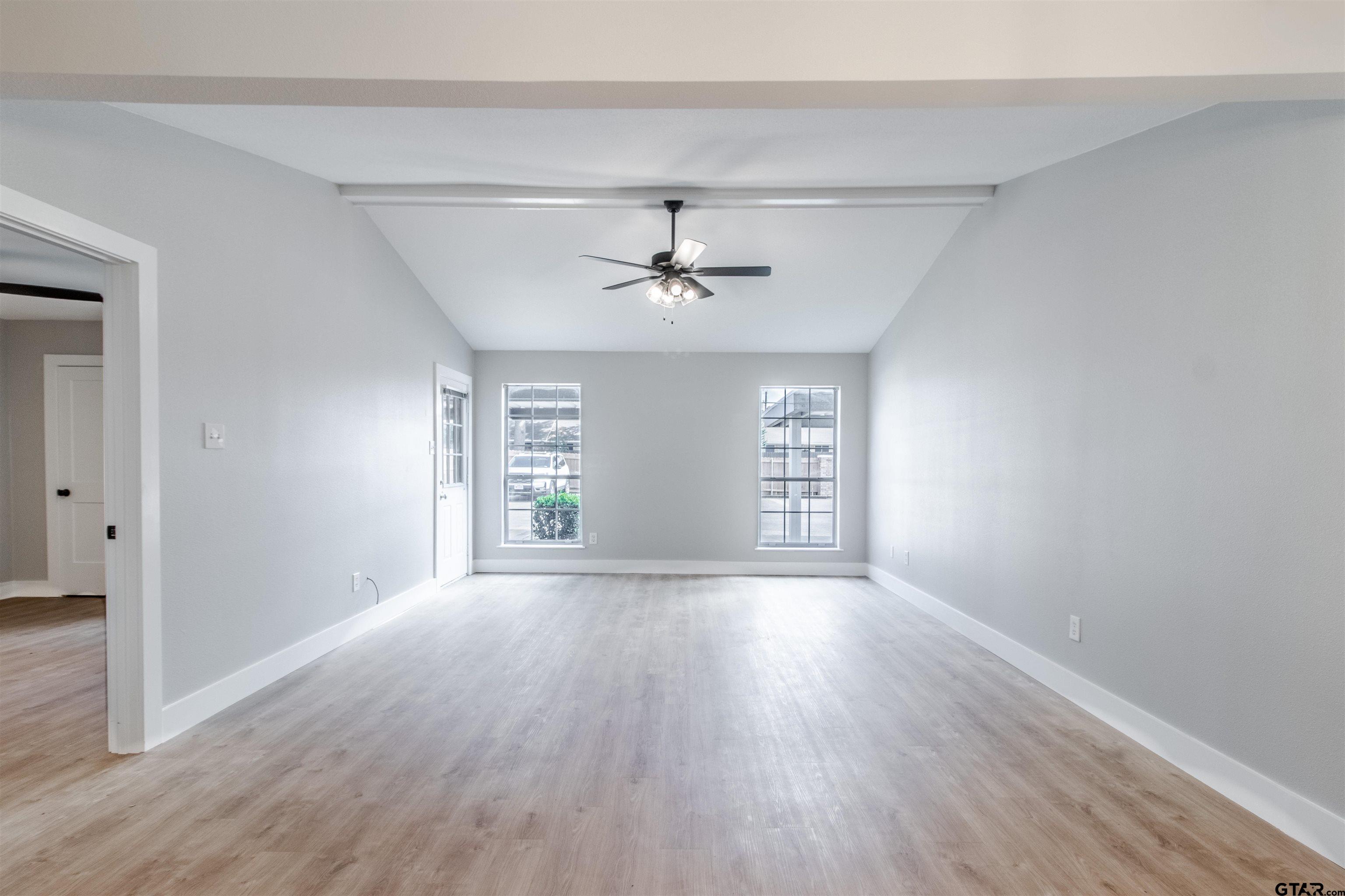 415 Thigpen Drive Tyler, TX 75703 - Photo 18 of 32 a view of a room window and wooden floor