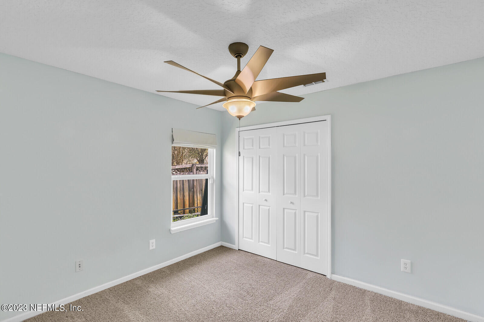 951 Silver Spring Court St. Augustine, FL 32092 - Photo 11 of 17 a view of an empty room with a window