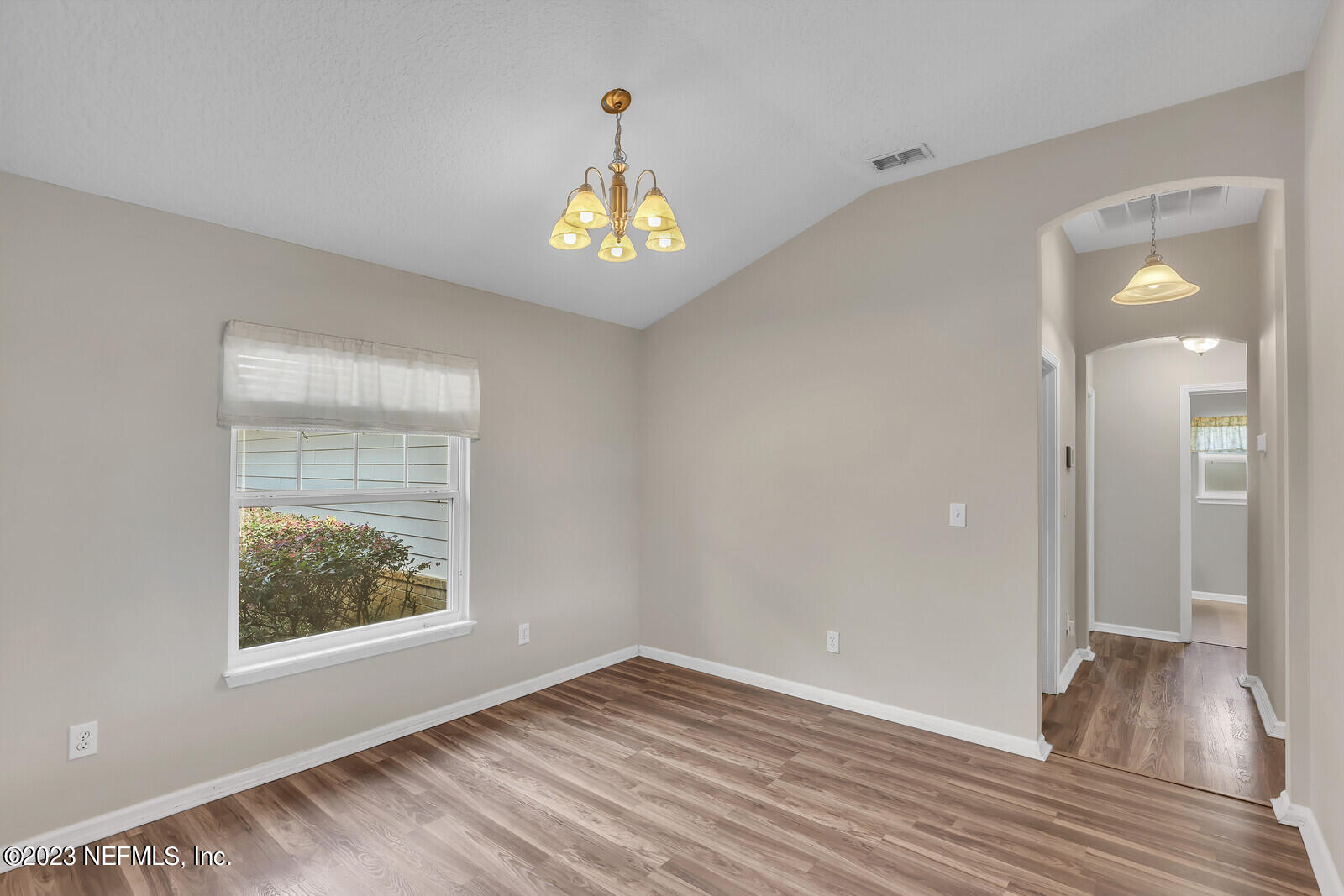 951 Silver Spring Court St. Augustine, FL 32092 - Photo 12 of 17 wooden floor in an empty room with a window