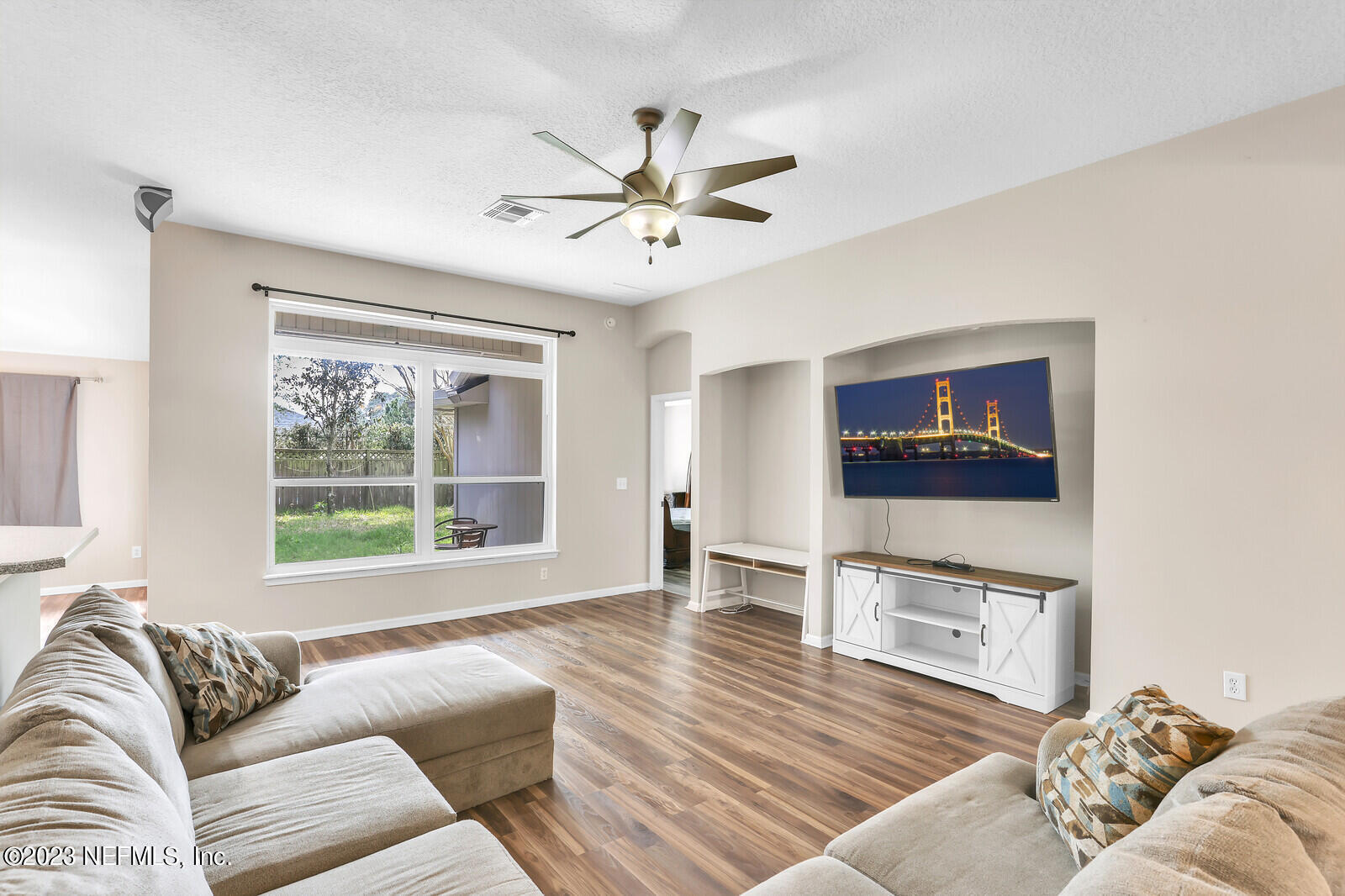 951 Silver Spring Court St. Augustine, FL 32092 - Photo 3 of 17 a living room with furniture and a large window