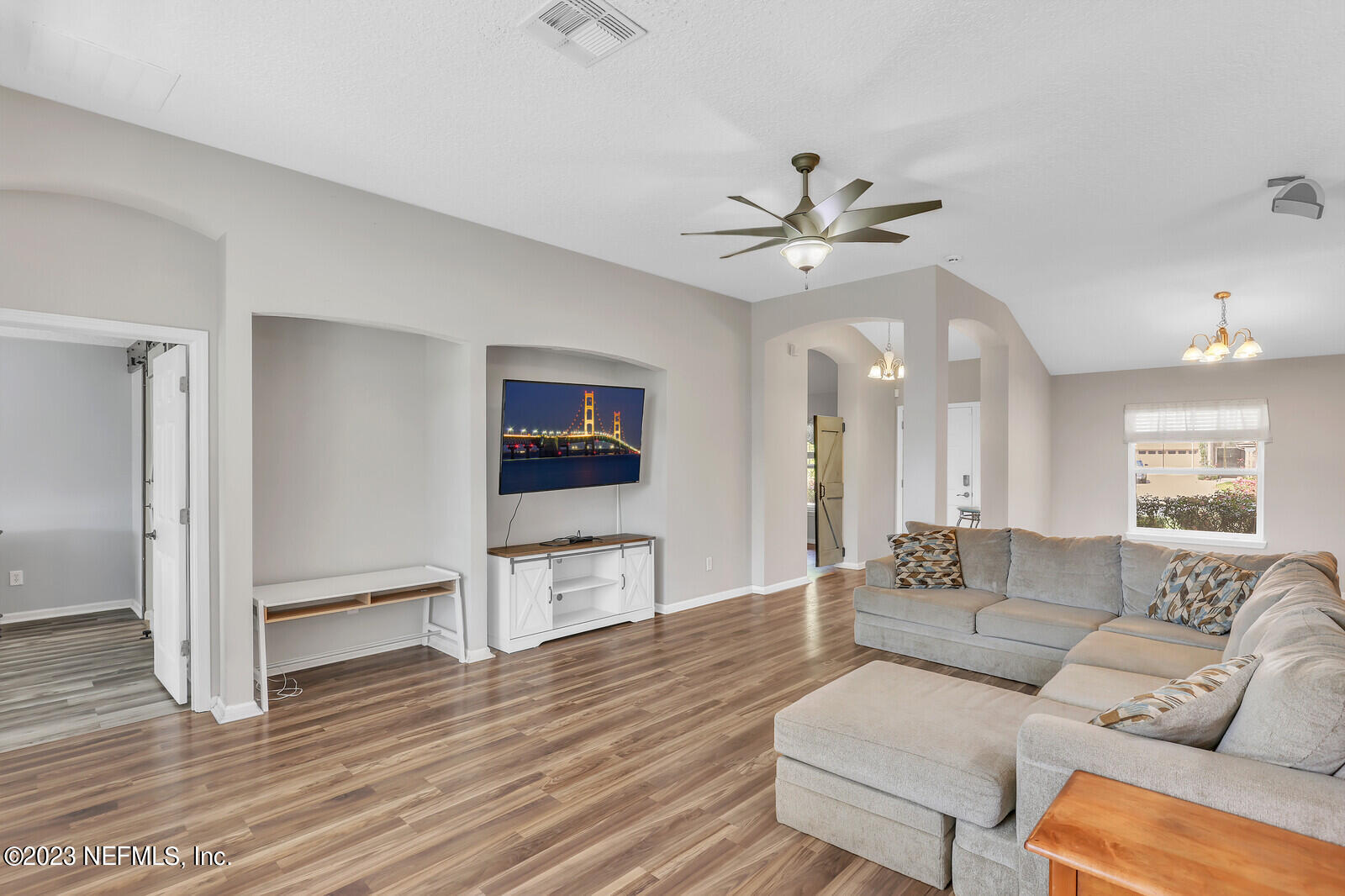 951 Silver Spring Court St. Augustine, FL 32092 - Photo 4 of 17 a living room with furniture and a wooden floor