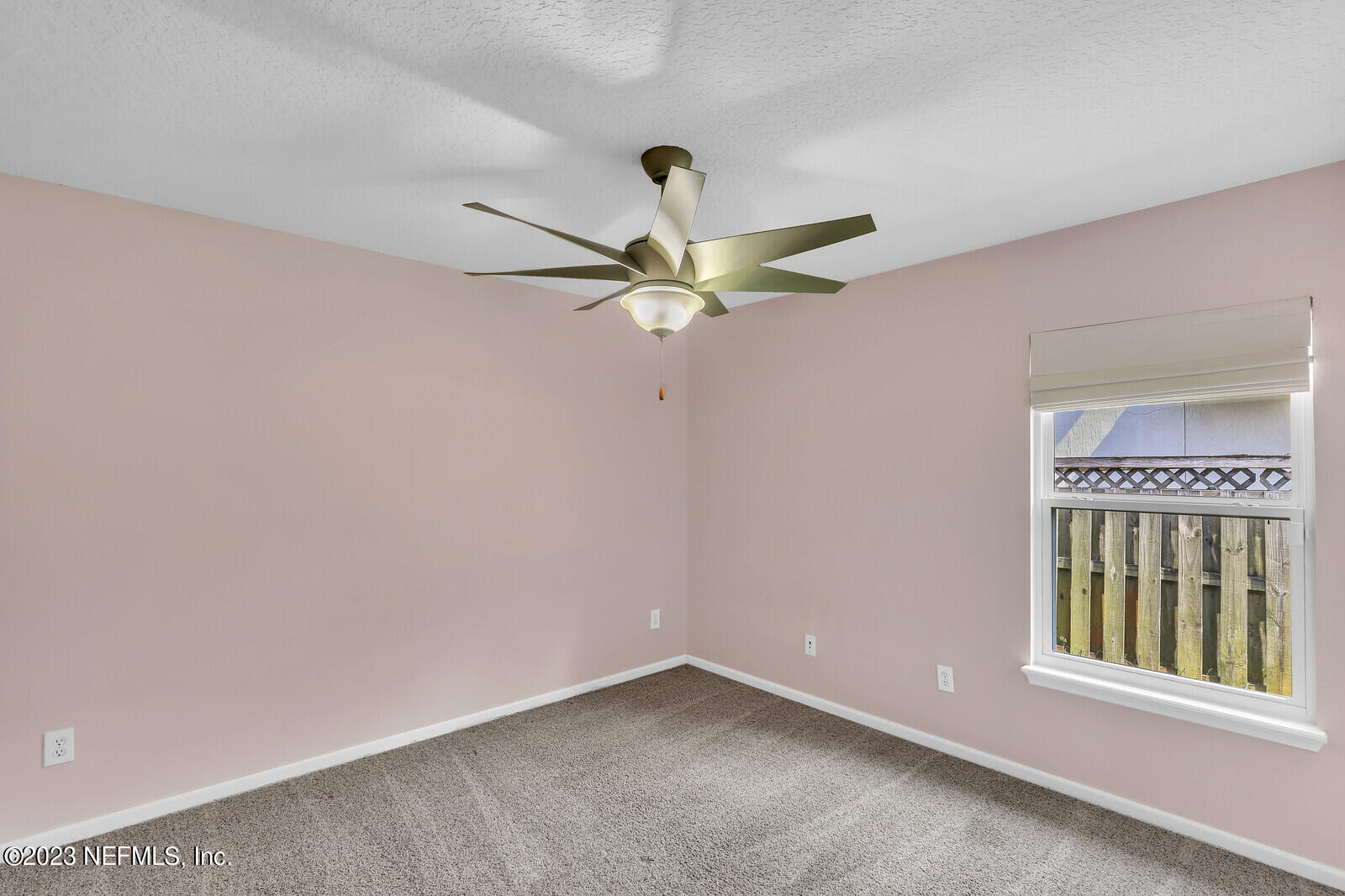 951 Silver Spring Court St. Augustine, FL 32092 - Photo 9 of 17 a view of an empty room with a window