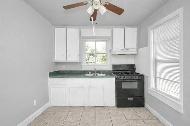 a bathroom with a sink a toilet and a bathtub
