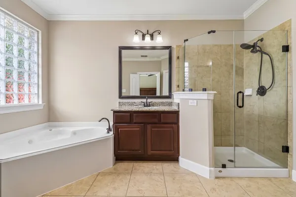 $945,000 | 15 Verdin Place, The Woodlands, TX 77389